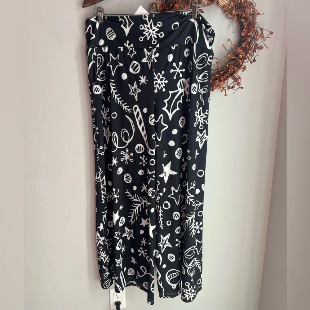139. Velvet Elegance Purple Satin Top and Black Star Print Culottes